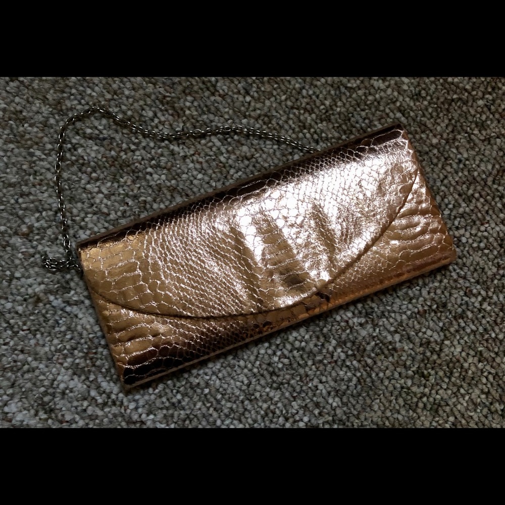 Rose gold faux snakeskin clutch